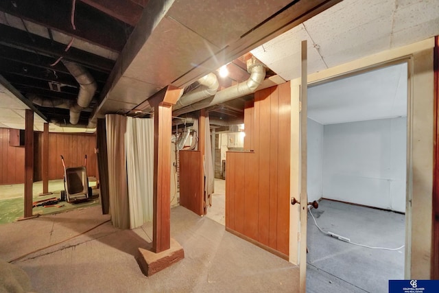 unfinished below grade area with wooden walls