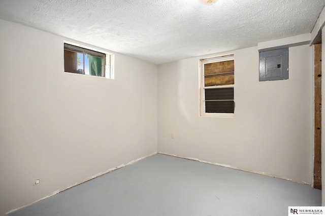 4230 N 11th St, Lincoln, NE 68521 - finished below grade area featuring a textured ceiling and electric panel