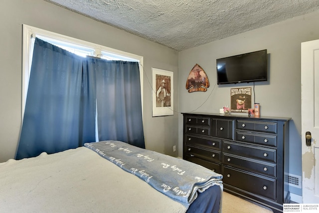 bedroom with a textured ceiling