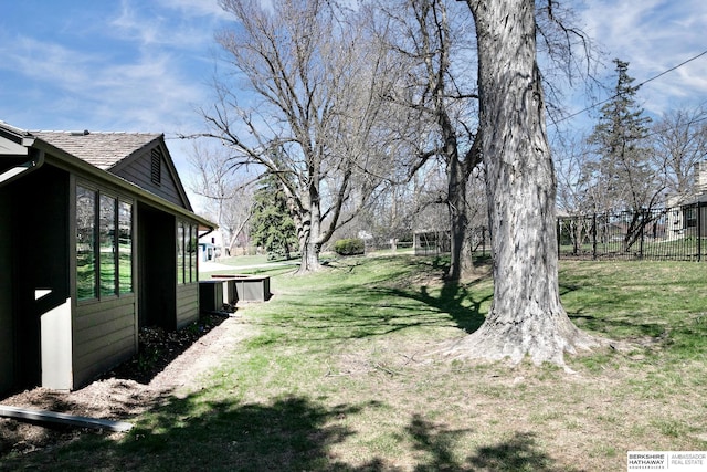 view of yard featuring fence