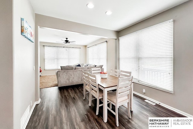 dining space featuring a ceiling fan, visible vents, dark wood finished floors, baseboards, and recessed lighting