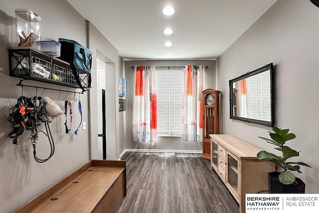 doorway to outside with recessed lighting, baseboards, and dark wood finished floors