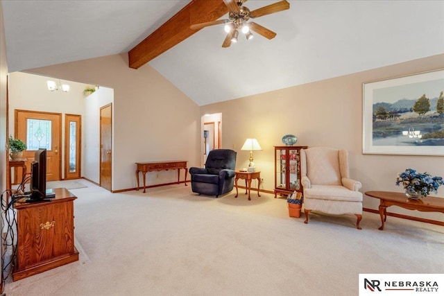 sitting room with baseboards, carpet flooring, lofted ceiling with beams, and ceiling fan