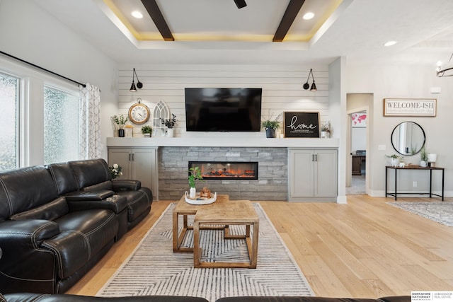 17026 Emma St, Bennington, NE 68007 - living room with recessed lighting, light wood-style flooring, and a fireplace