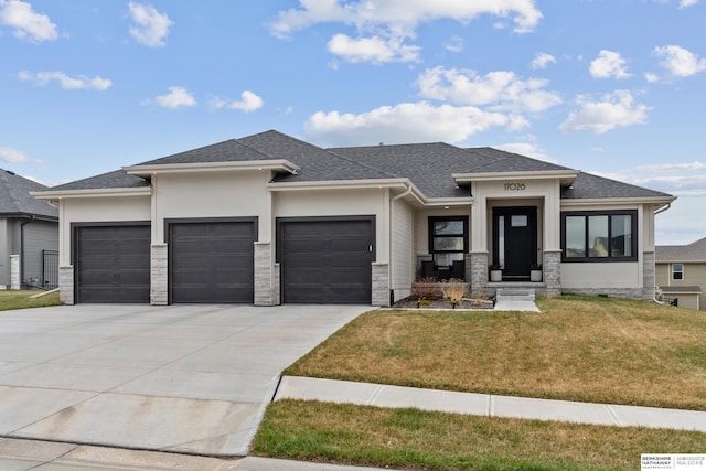 17026 Emma St, Bennington, NE 68007 - prairie-style home featuring a garage, stone siding, a front yard, stucco siding, and concrete driveway