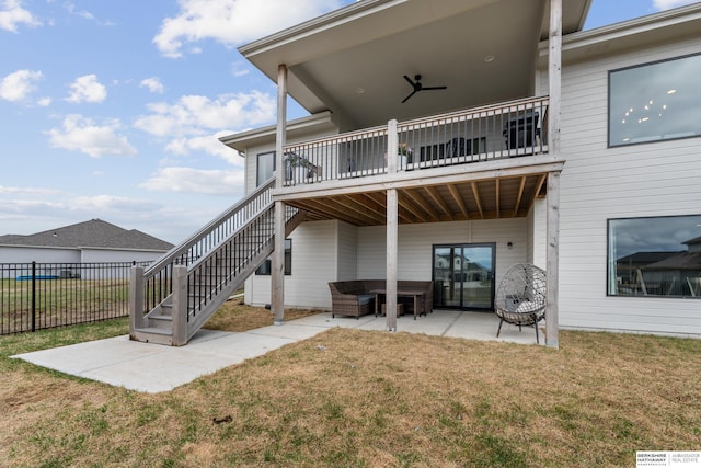 17026 Emma St, Bennington, NE 68007 - rear view of house featuring fence, a patio, an outdoor hangout area, stairs, and a lawn