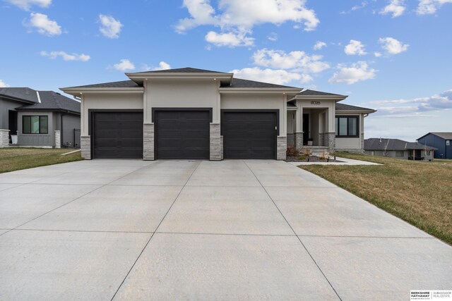 17026 Emma St, Bennington, NE 68007 - prairie-style home featuring a garage, a front yard, stone siding, stucco siding, and concrete driveway