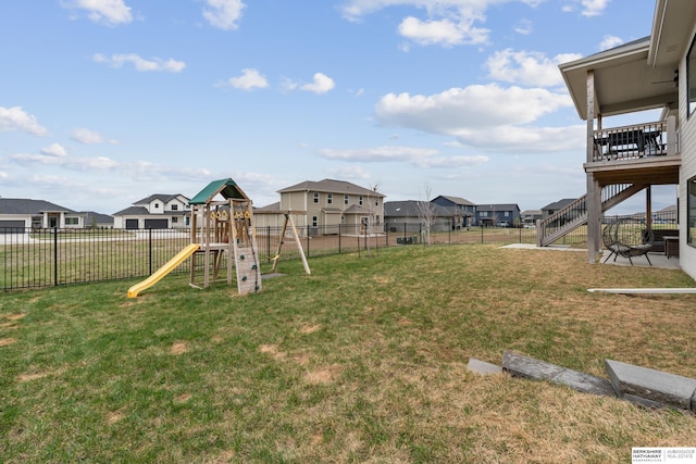 17026 Emma St, Bennington, NE 68007 - view of yard with a residential view, a fenced backyard, and a playground