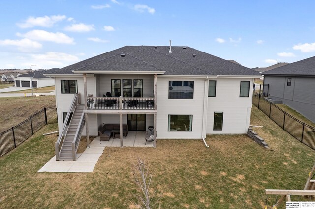 17026 Emma St, Bennington, NE 68007 - back of property featuring a fenced backyard, stairs, a yard, and a patio area