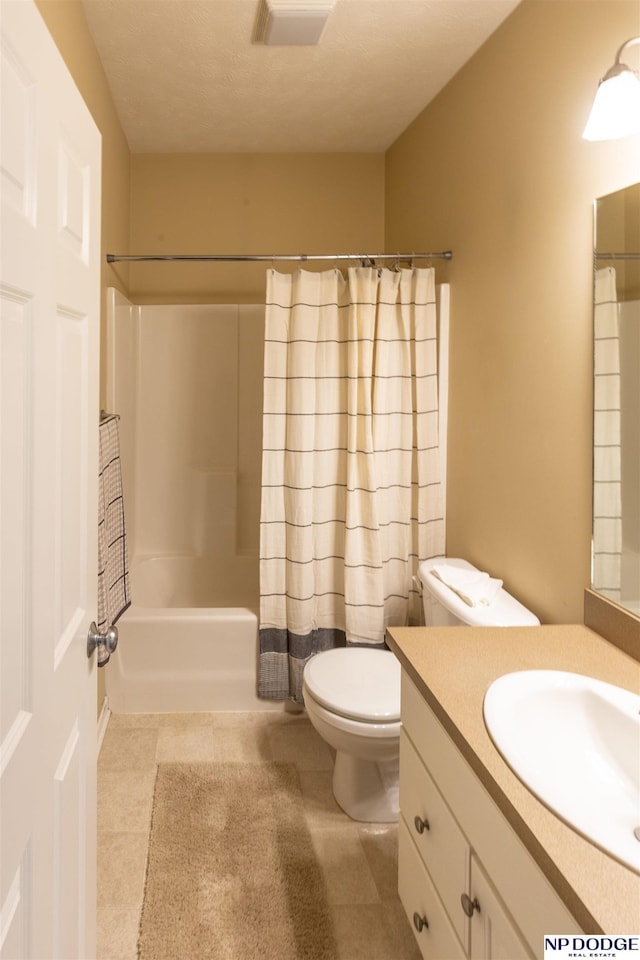 bathroom with vanity, shower / tub combo with curtain, tile patterned flooring, visible vents, and toilet