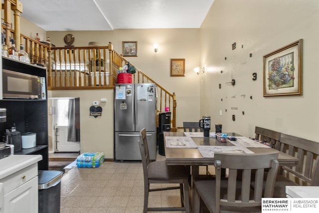 109 W Elk St, Hooper, NE 68031 - dining room with stairway and a towering ceiling