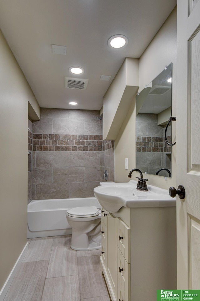full bath with toilet, bathtub / shower combination, vanity, and visible vents