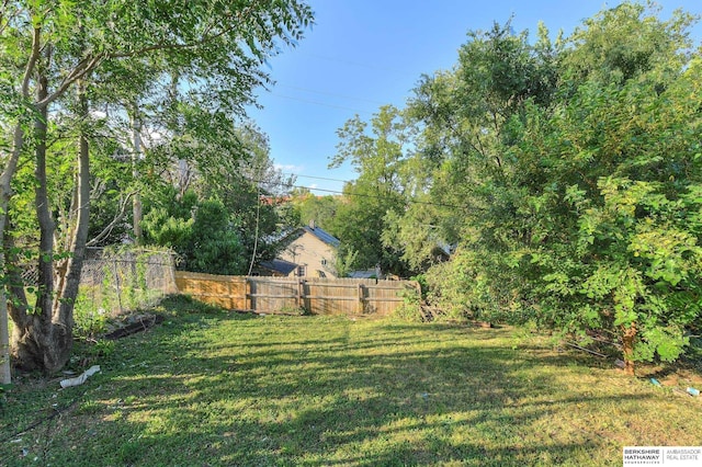 view of yard with fence