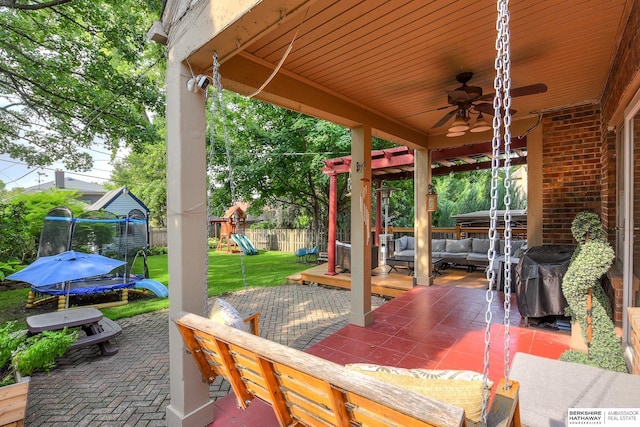5117 Western Ave, Omaha, NE 68132 - view of patio with a trampoline, an outdoor living space, a playground, and ceiling fan