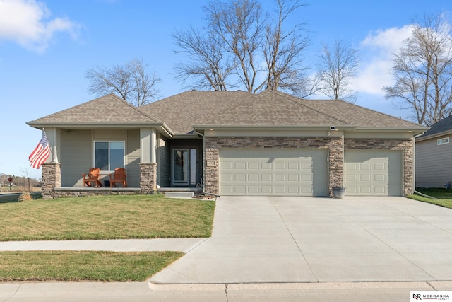 view of front facade featuring a front lawn, stone siding, roof with shingles, concrete driveway, and an attached garage