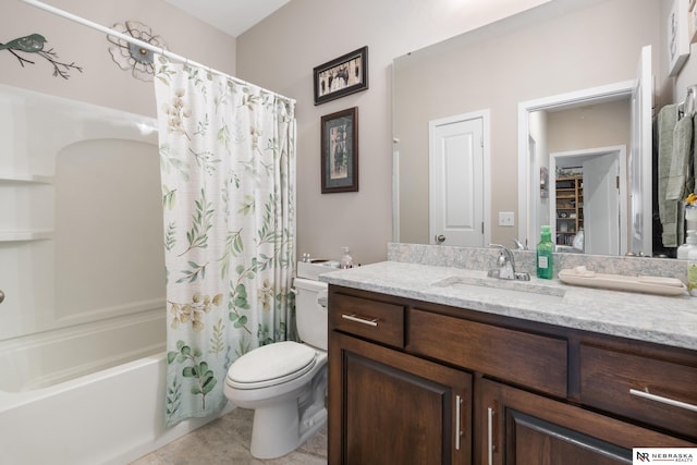full bathroom with vanity, toilet, tile patterned flooring, and shower / bath combo with shower curtain