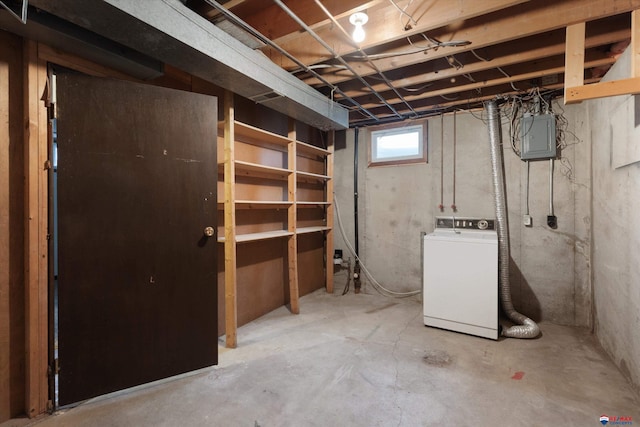 below grade area featuring washer / dryer and electric panel