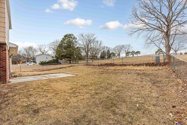view of yard featuring a fenced backyard and a patio