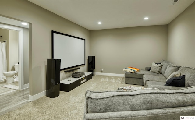 home theater room with recessed lighting, carpet, and baseboards