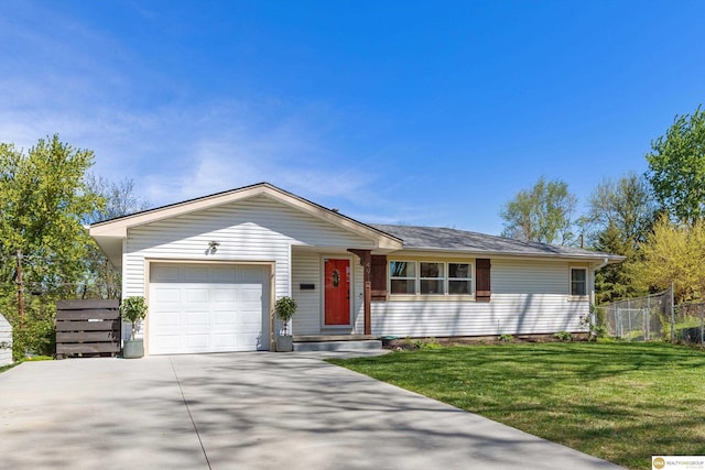 ranch-style house featuring fence, a front lawn, driveway, and a garage