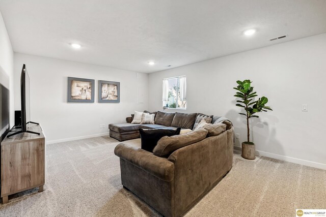 living room with light colored carpet, baseboards, visible vents, and recessed lighting