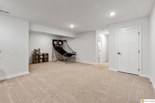 interior space featuring carpet flooring, recessed lighting, baseboards, and visible vents