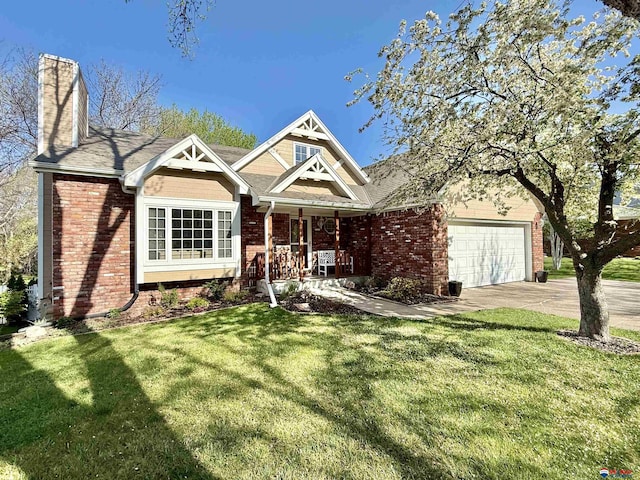 craftsman-style house featuring a porch, brick siding, a chimney, and a front yard