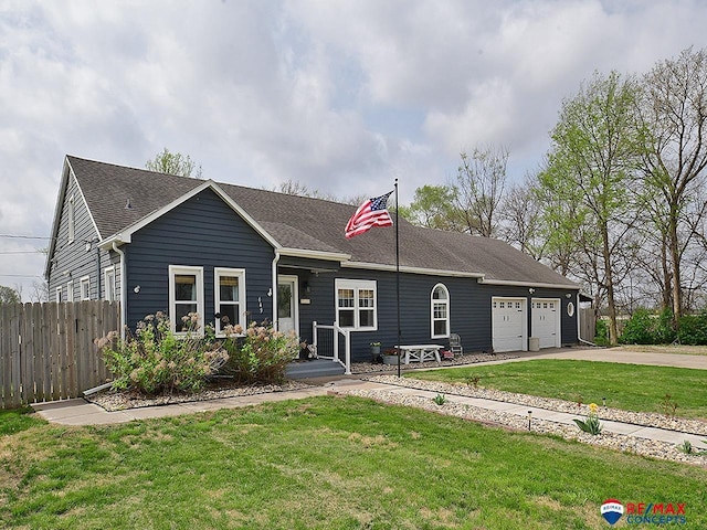 single story home featuring aphalt driveway, fence, a front yard, roof with shingles, and an attached garage
