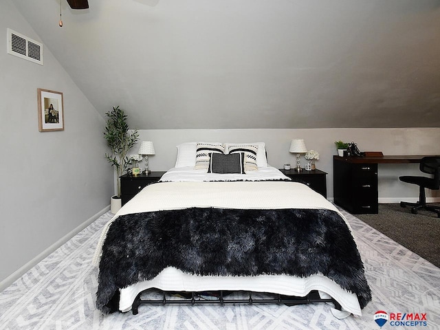 bedroom featuring ceiling fan, visible vents, baseboards, lofted ceiling, and carpet flooring