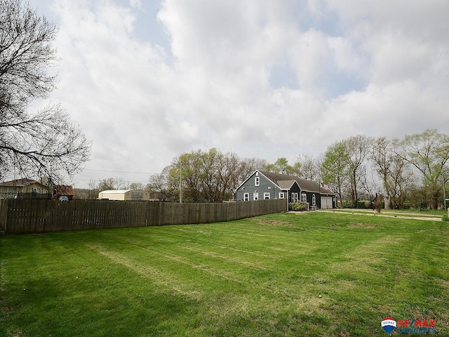 view of yard with fence