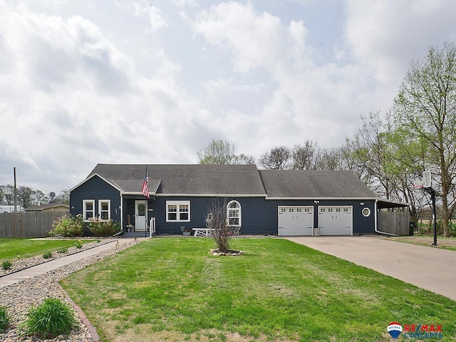 ranch-style house featuring a garage, fence, driveway, and a front yard
