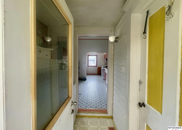 hall featuring light floors