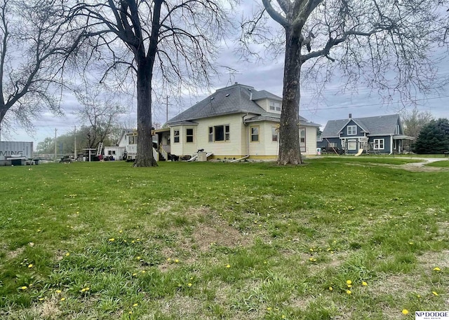 view of property exterior with a lawn