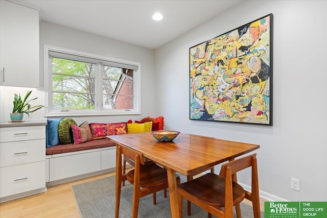 dining room featuring recessed lighting and light wood-style flooring