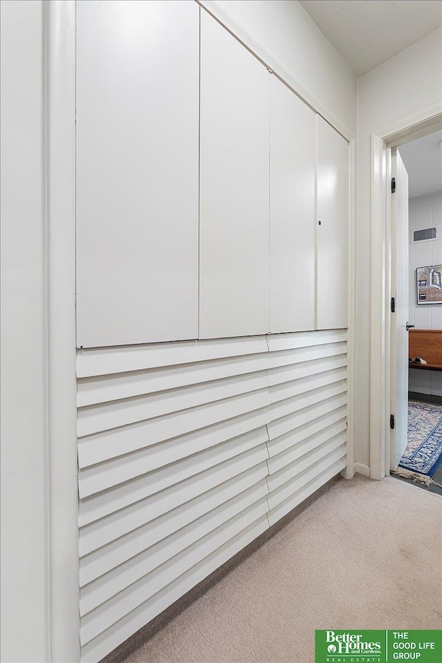 interior space with visible vents and carpet floors