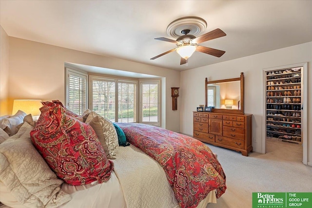 carpeted bedroom featuring a ceiling fan