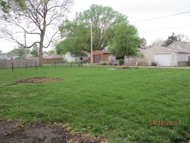 view of yard featuring fence