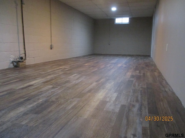 below grade area featuring wood finished floors