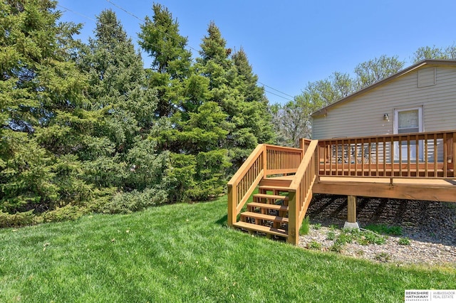 view of yard featuring stairs and a deck