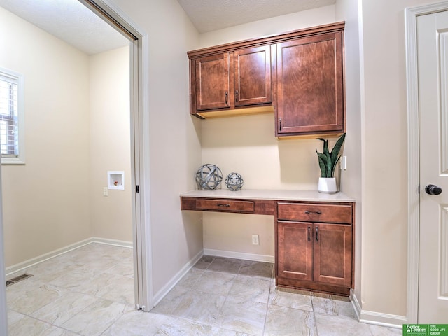 laundry area with washer hookup, baseboards, laundry area, and visible vents