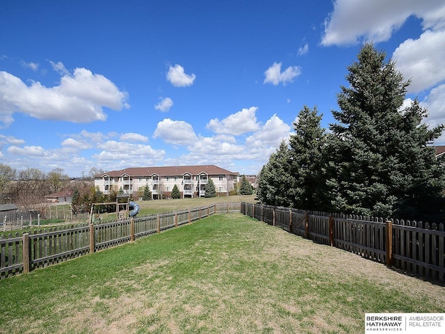 view of yard featuring a fenced backyard