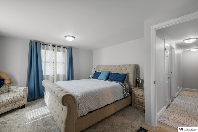 bedroom featuring carpet