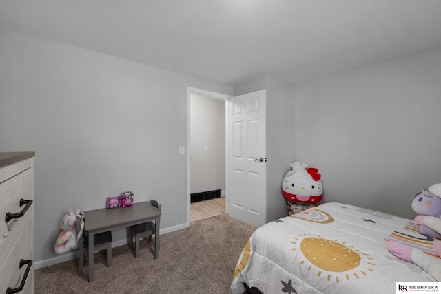 bedroom featuring carpet floors, baseboards, and visible vents