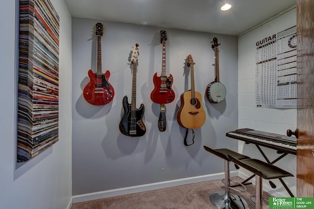 misc room featuring baseboards and carpet flooring