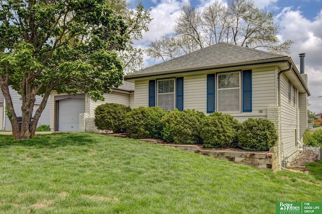 view of front of property with a shingled roof and a front yard