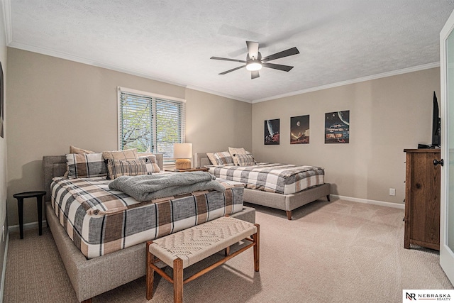 bedroom with ceiling fan, light colored carpet, a textured ceiling, baseboards, and ornamental molding