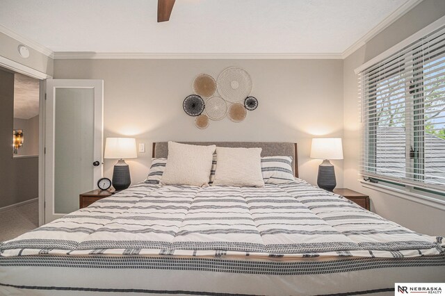bedroom featuring ornamental molding and ceiling fan