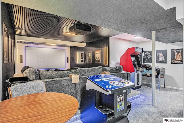 carpeted home theater featuring baseboards