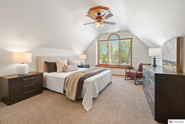 S-1007 Shady Ln, Fremont, NE 68025 - bedroom featuring light carpet, lofted ceiling, and a ceiling fan