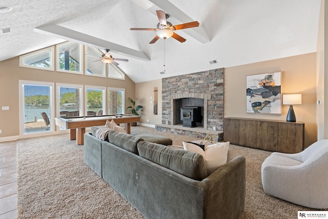 S-1007 Shady Ln, Fremont, NE 68025 - carpeted living room featuring billiards table, ceiling fan, high vaulted ceiling, and baseboards